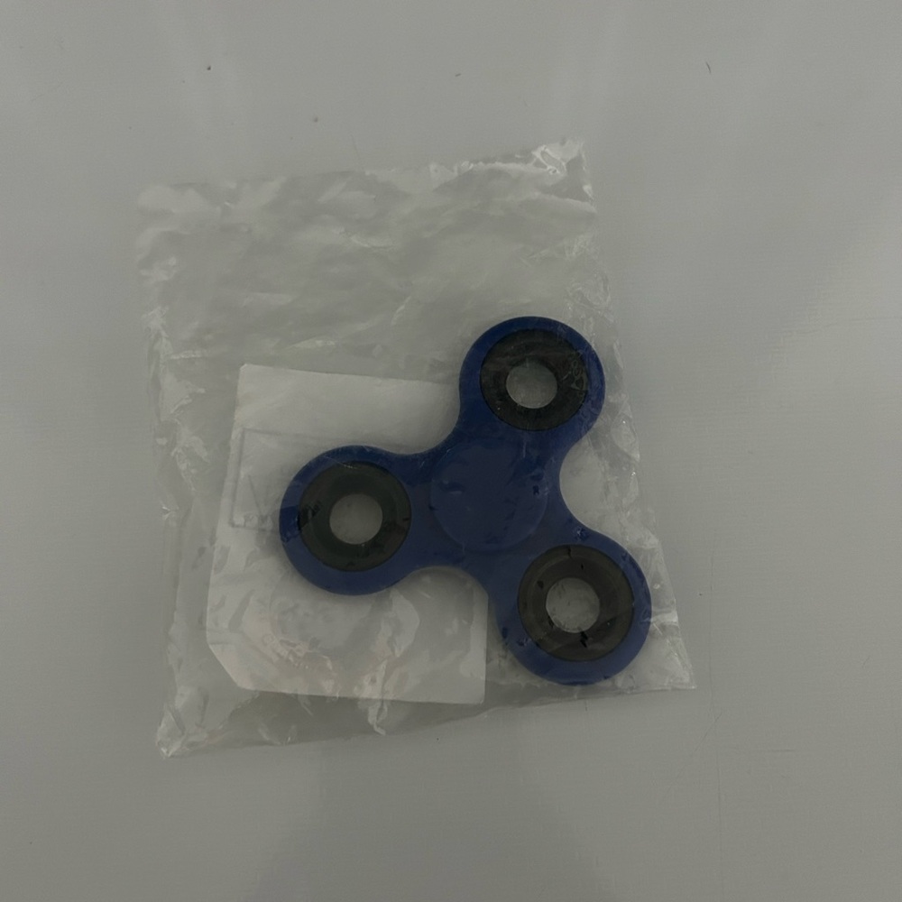 Blue fidget spinner. New in packaging
